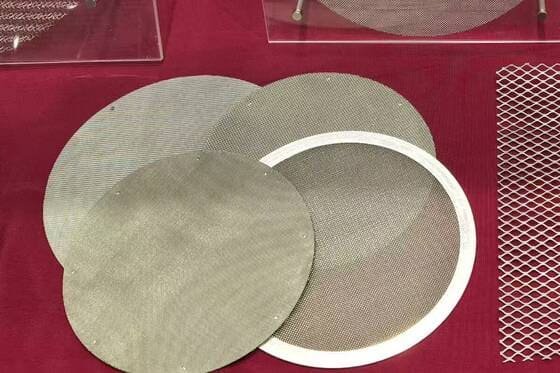 Woven stainless steel wire mesh filter disc with a clean cut edge, ready for a welded support ring