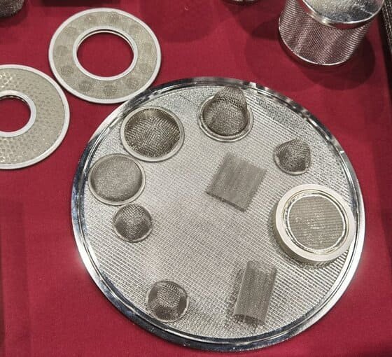 Custom woven stainless steel wire mesh filter element with a welded frame, support layers and connection